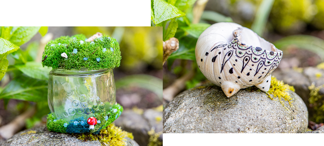 Miniature moss-covered jar and decorative ceramic snail